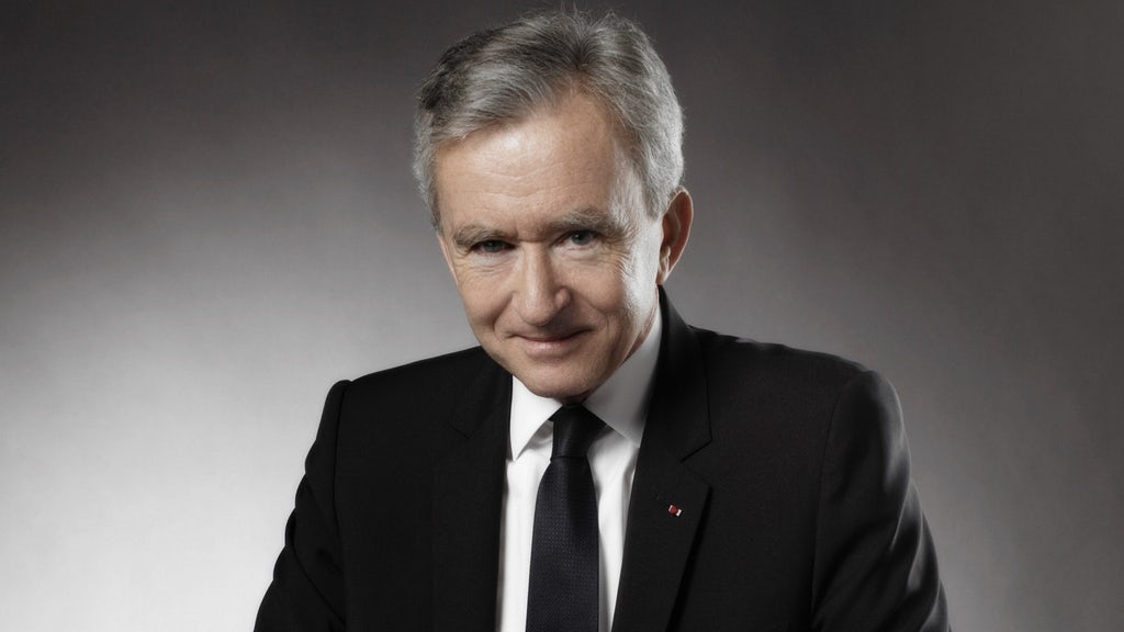Arnault Family Restructures LVMH Holdings to Consolidate Control