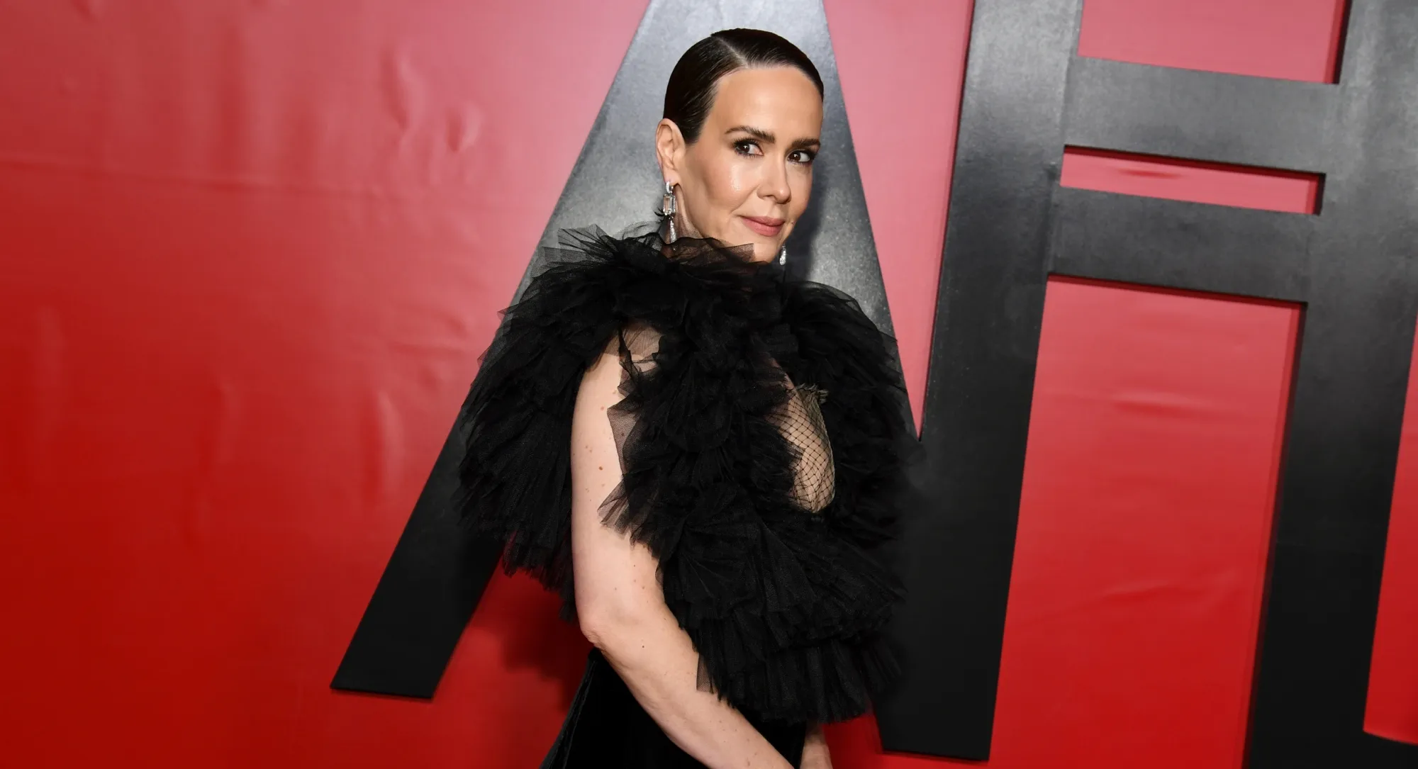 Sarah Paulson Ruffles the Lines Between Runway and Dark Glamour