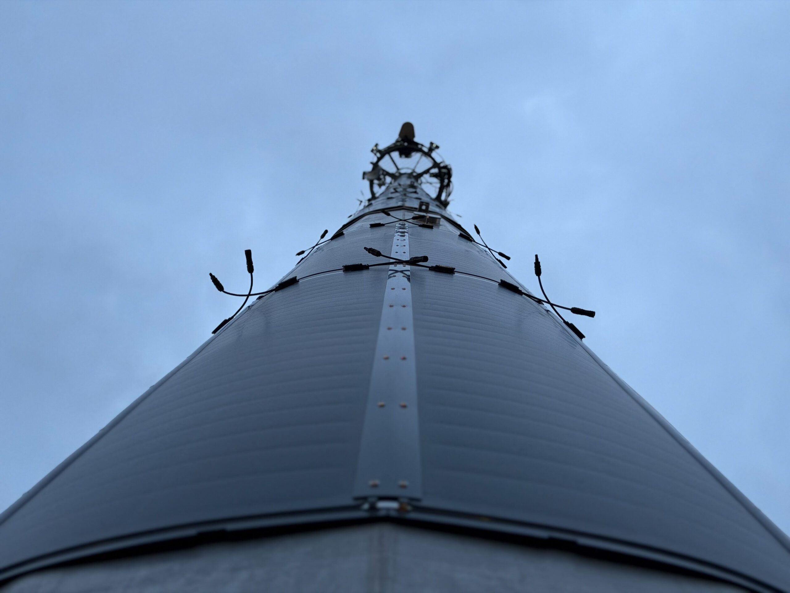 Solar sleeves turn telecommunications towers into renewable power generators