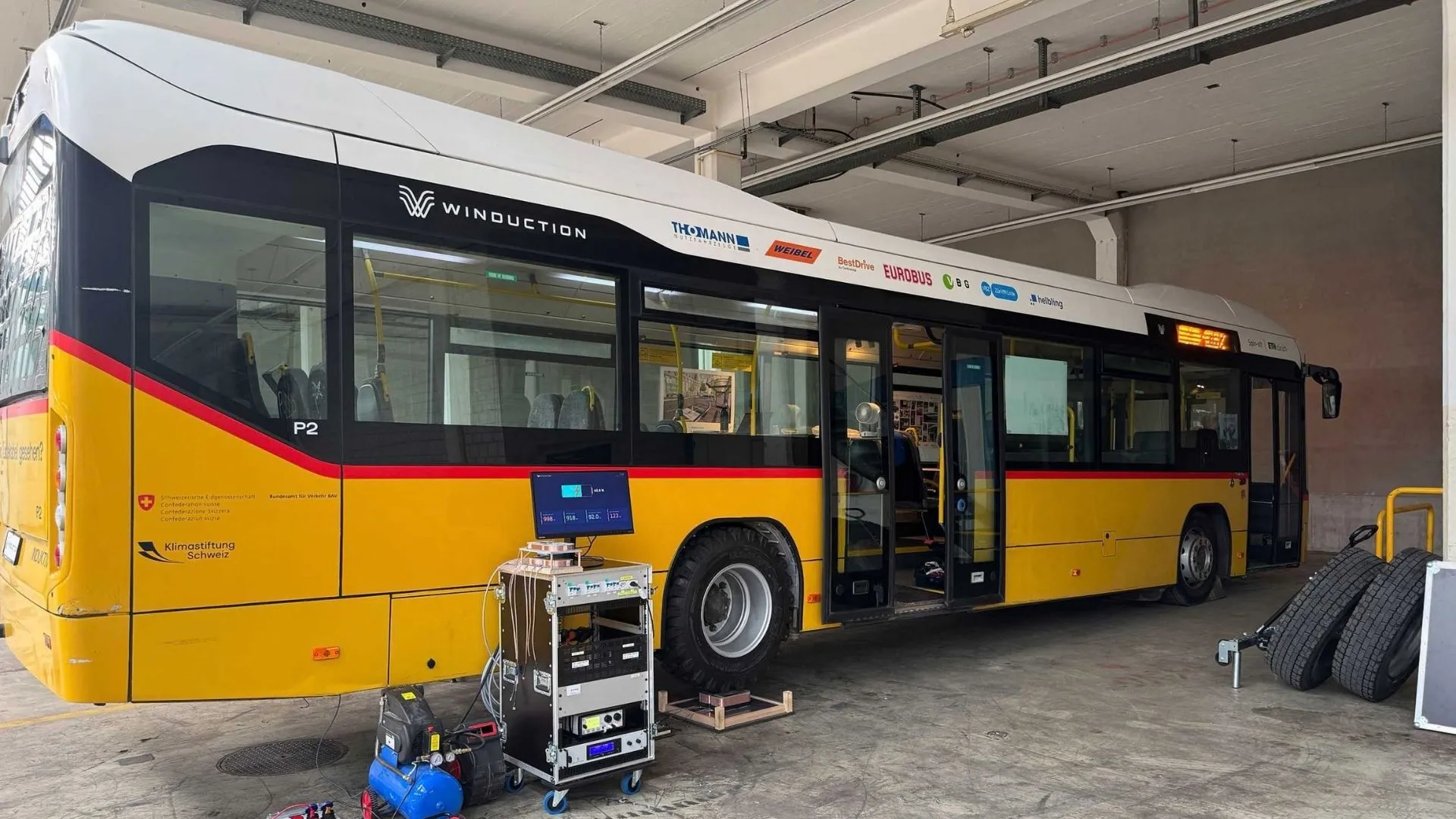New electric bus system charges through its tires with over 90% efficiency