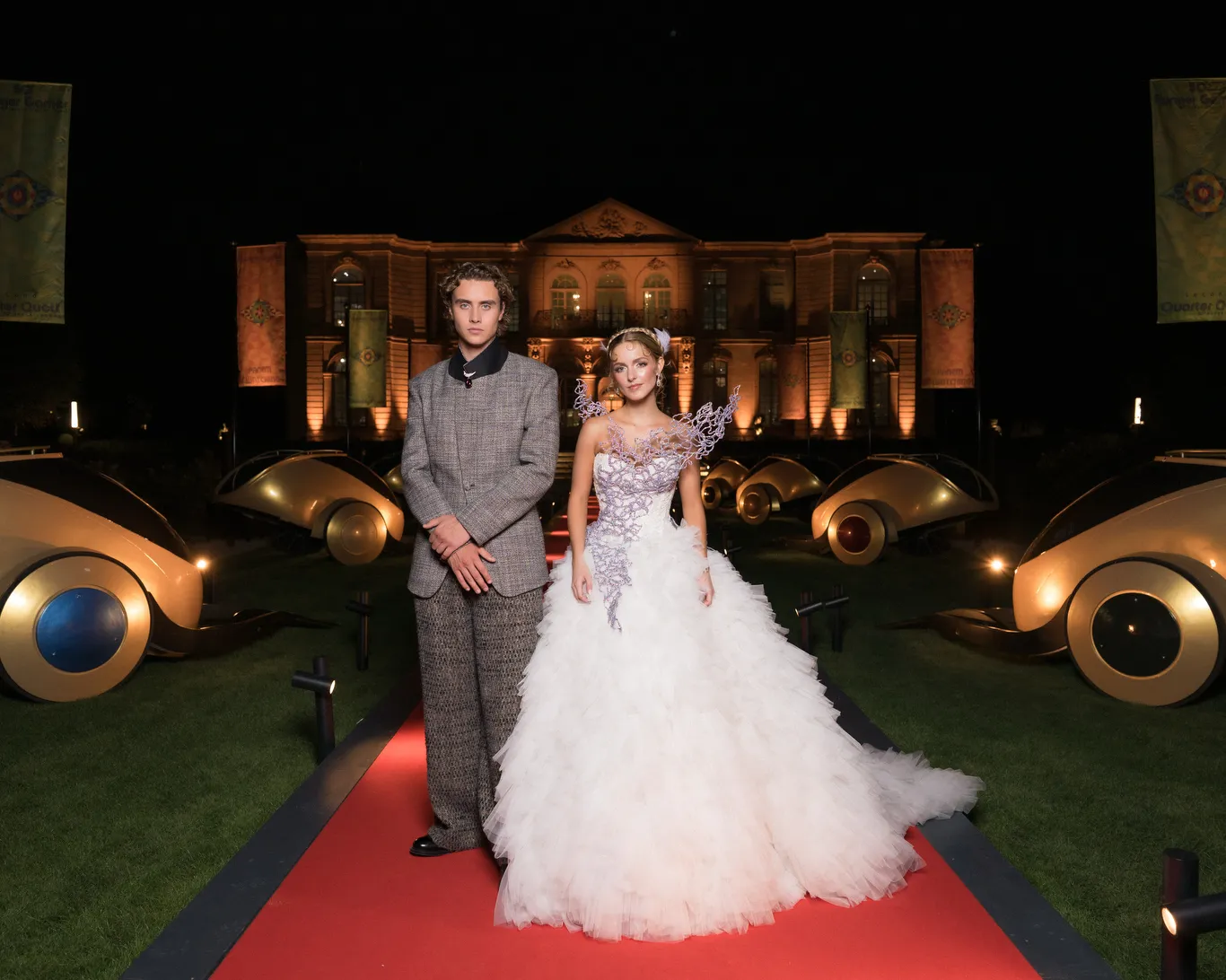 Mckenna Grace, Joseph Zada Celebrate Paris Exhibition on ‘Hunger Games’ Style