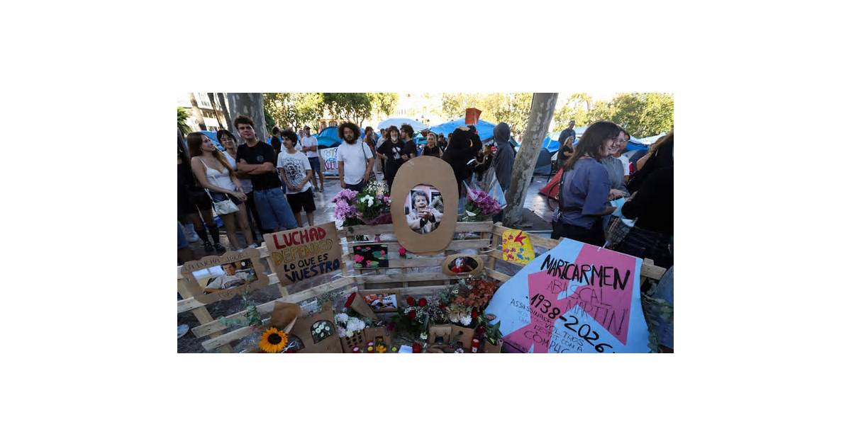 Thousands of Spaniards march to mark death of octogenarian at heart of housing protests