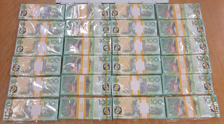 Counterfeit cash is at an eight‑year high in Australia. Here’s how to spot it