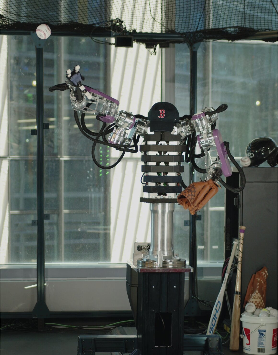 Two-armed robot throws and catches balls with human-like movements