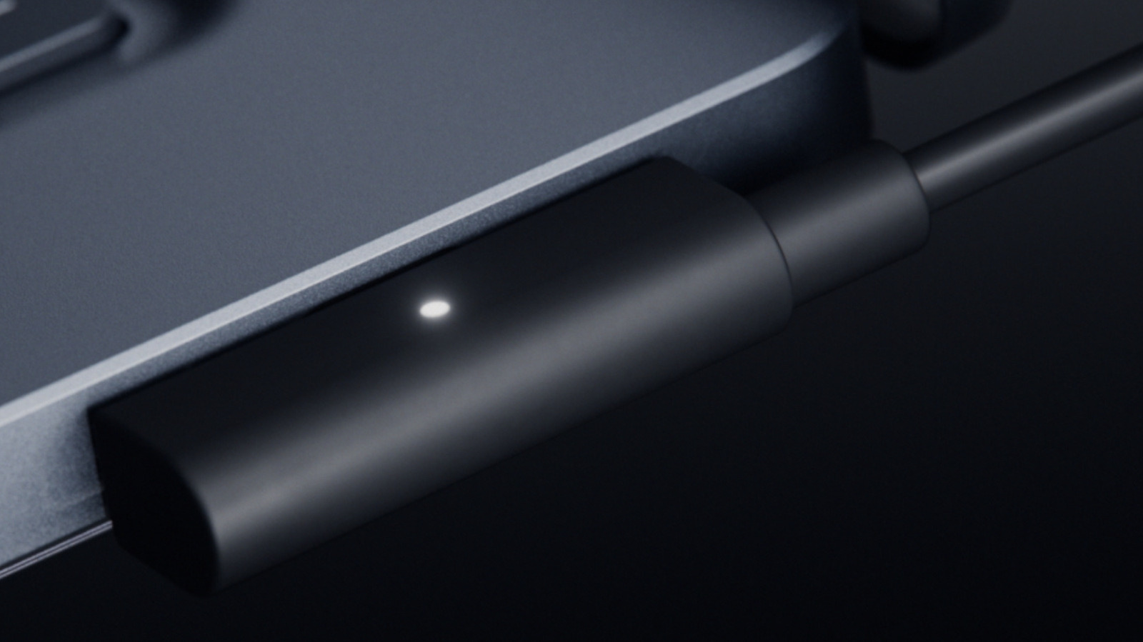 How is Microsoft's Magnetic Connect different from Apple's MagSafe for MacBooks?