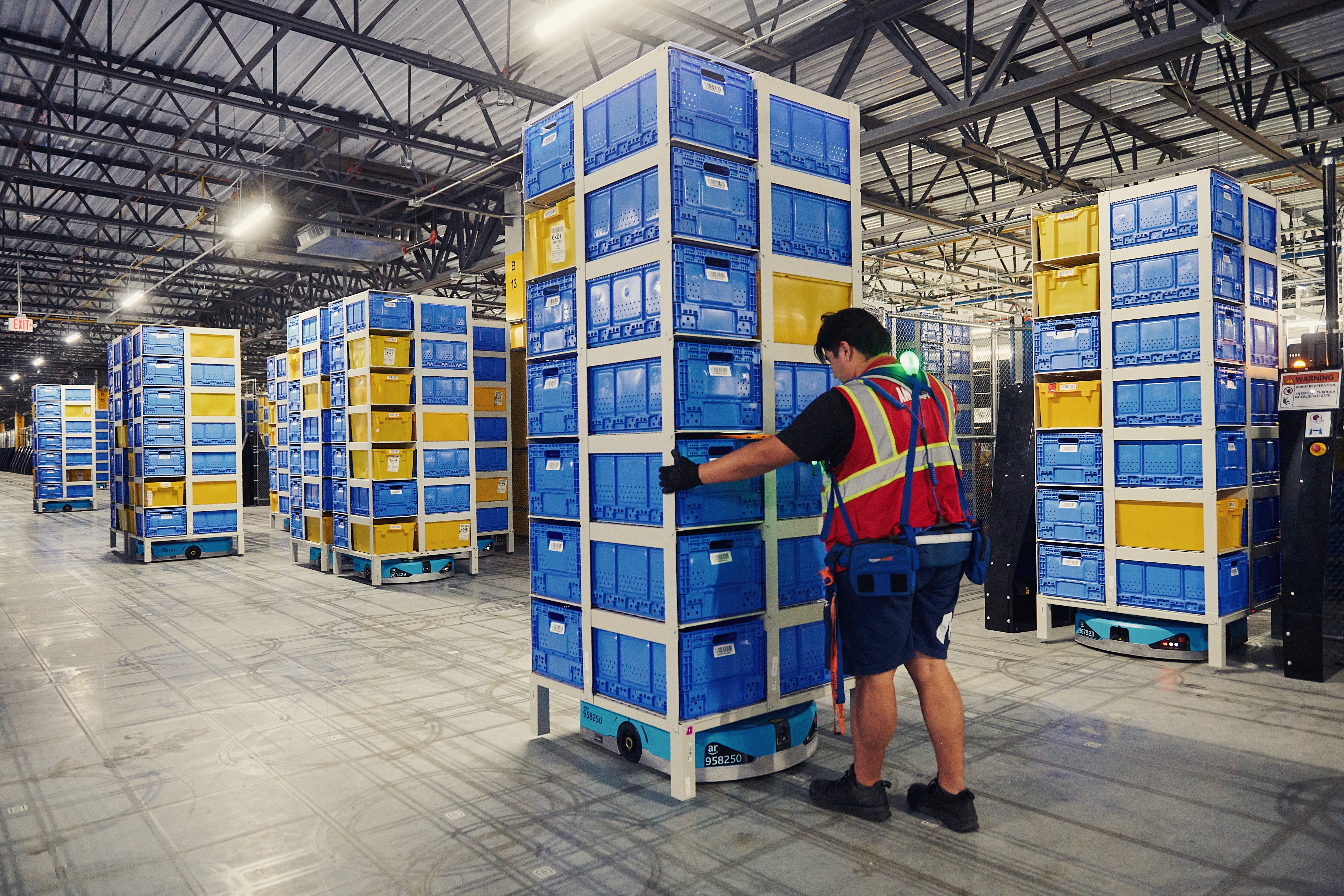 Inside Amazon’s robotic arms race and what it means for the future of human work