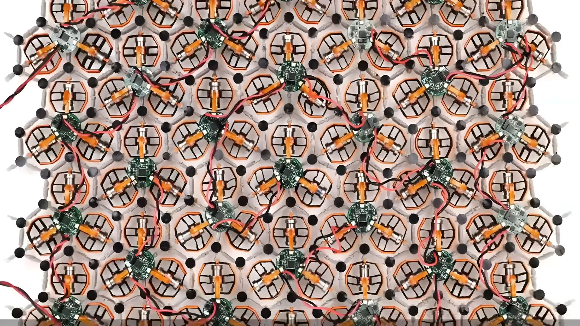 37-unit robotic material synchronizes movement without a clock or central control