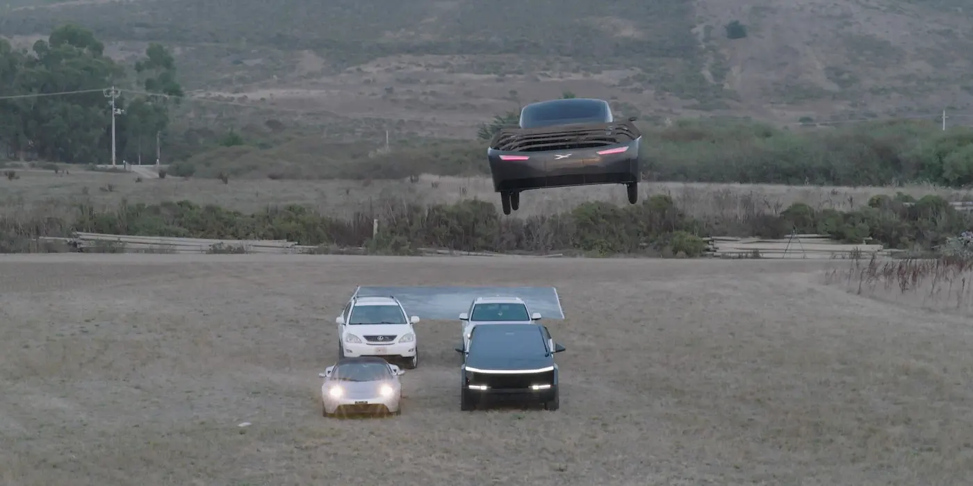 Alef welcomes Tesla to the electric flying car race by flying over the Roadster [Video]