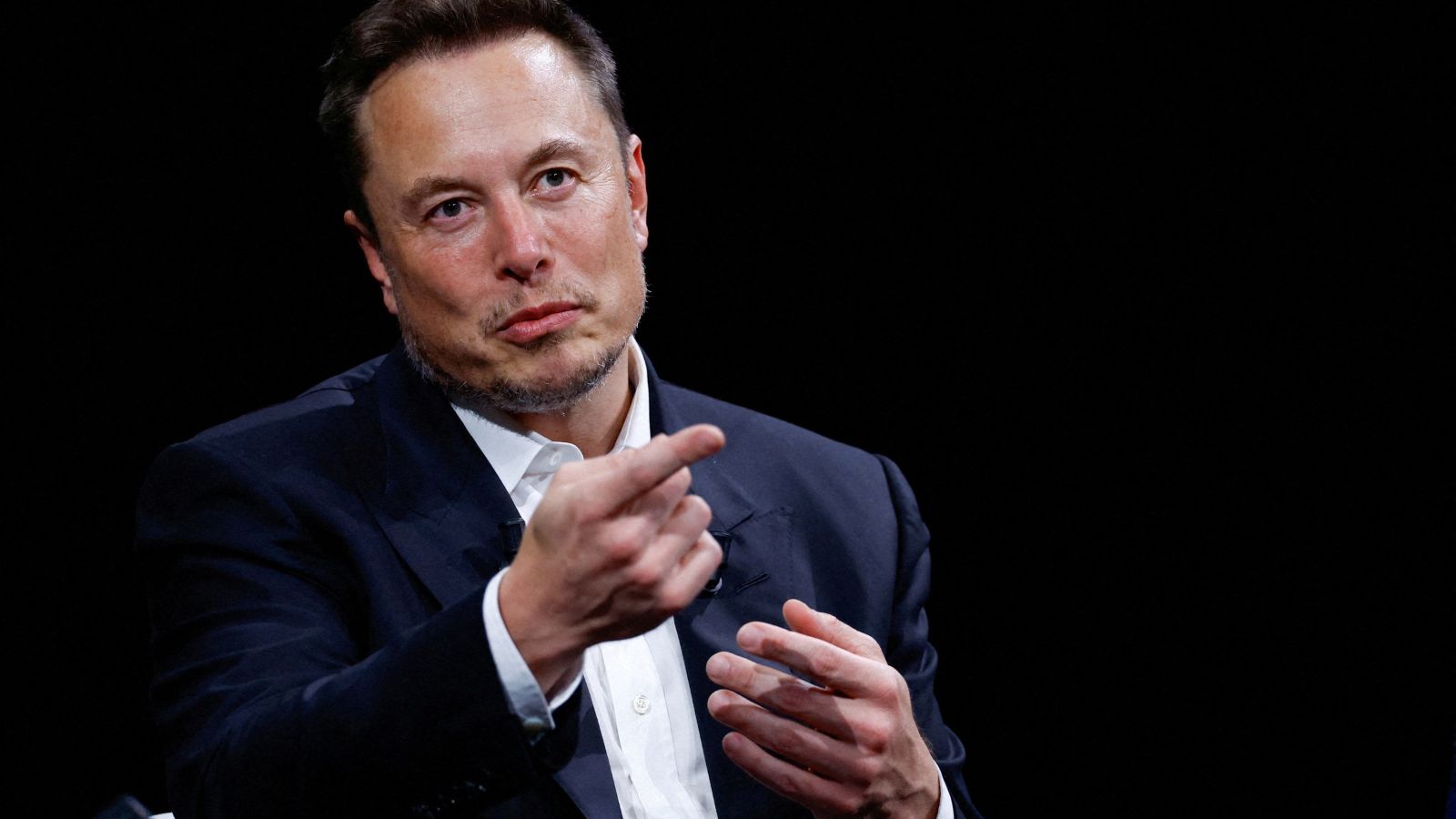 Wall Street says Tesla-SpaceX deal inevitable but Musk says it's not certain