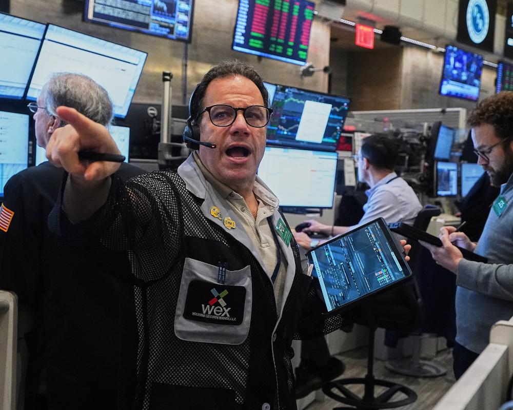 Sharp drops for AI stocks overwhelm markets worldwide as oil prices jump