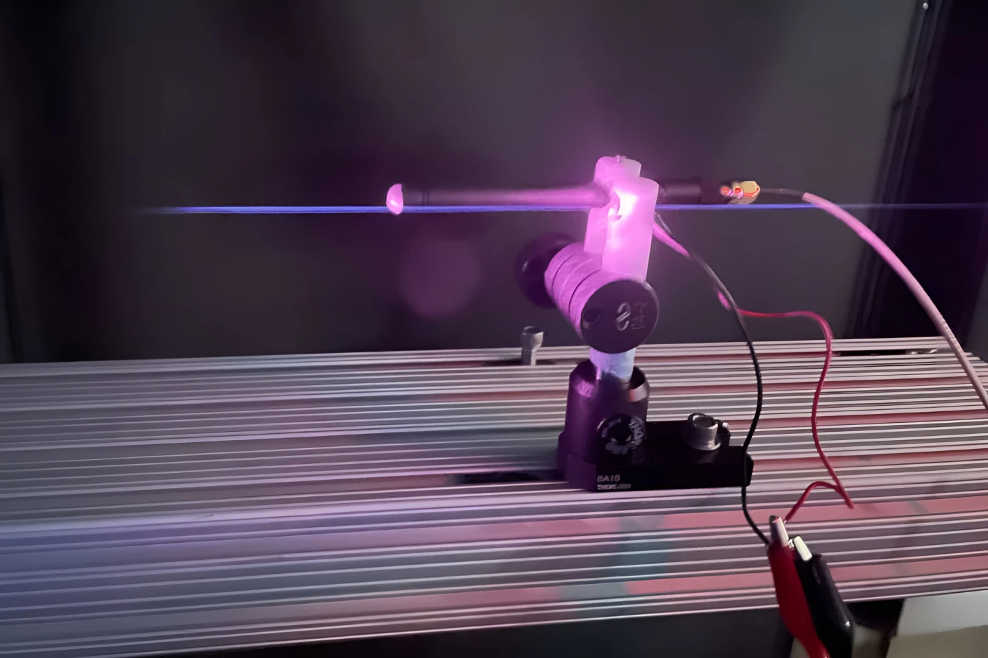 Lightsaber-like plasma beam antenna is tuned by laser