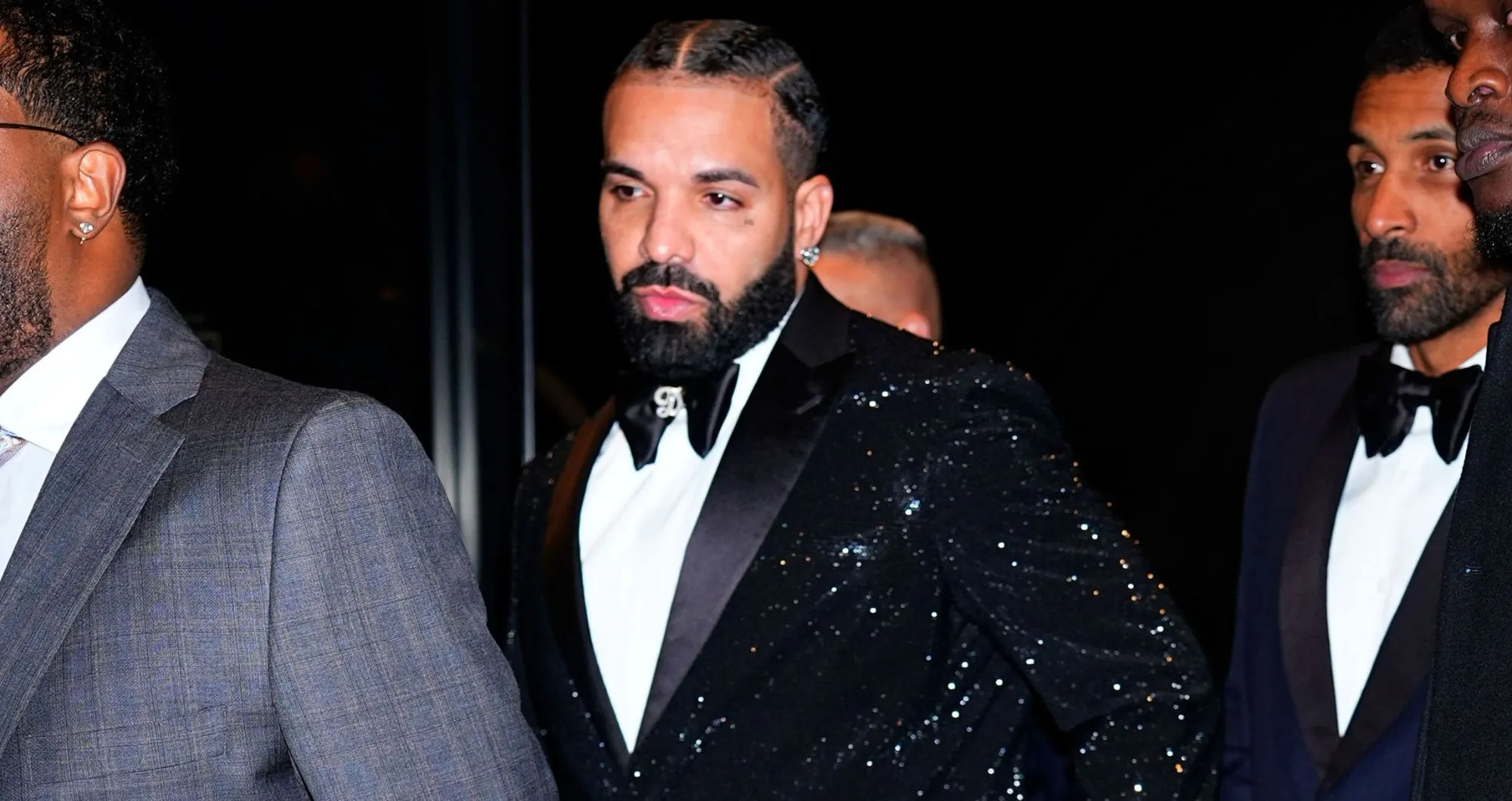 Drake Dapperly Dons Sparkling Black Suit Jacket While in New York for His Pre-Birthday Bash