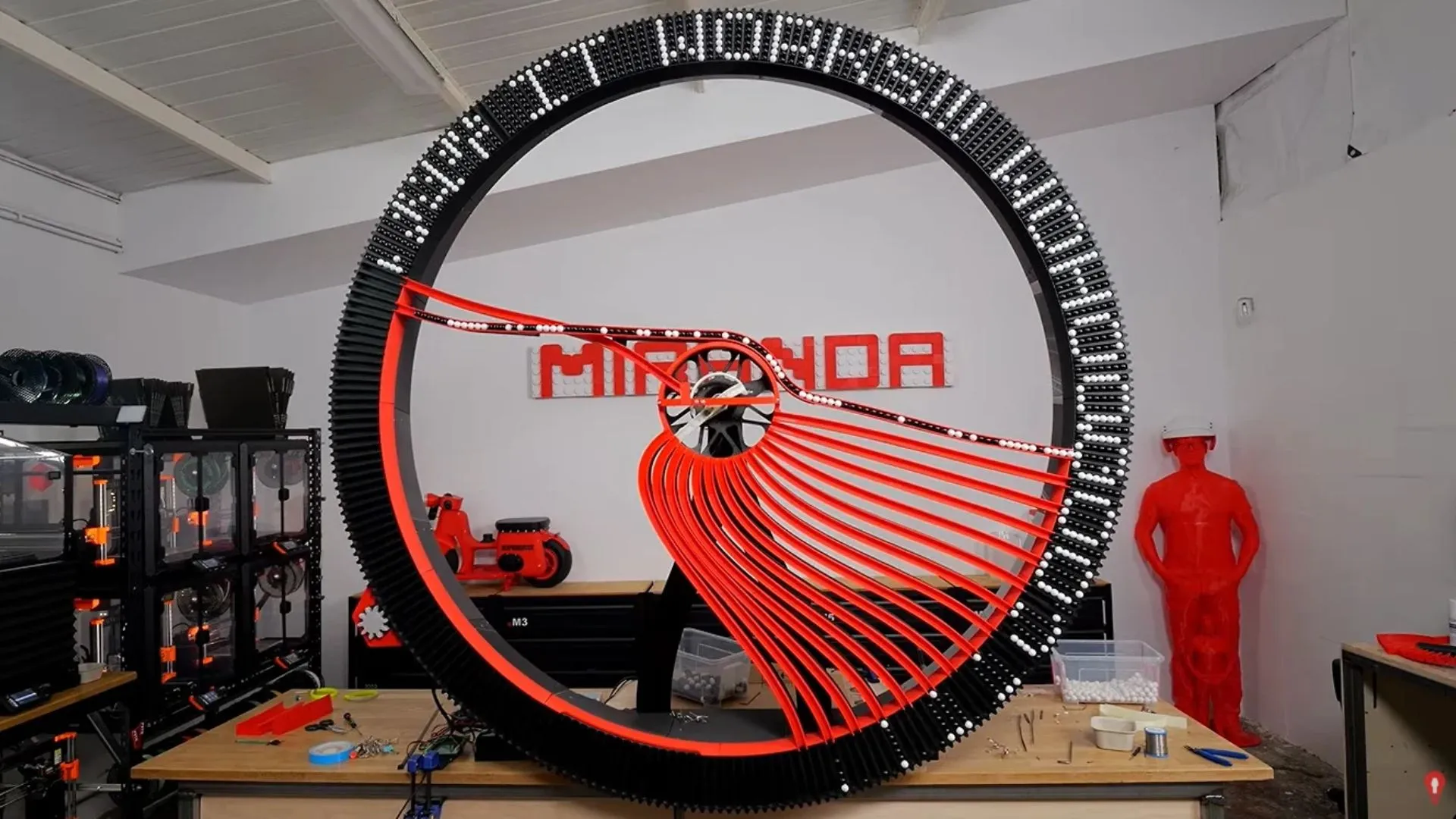 Engineer builds massive scroller that can write text endlessly with marbles