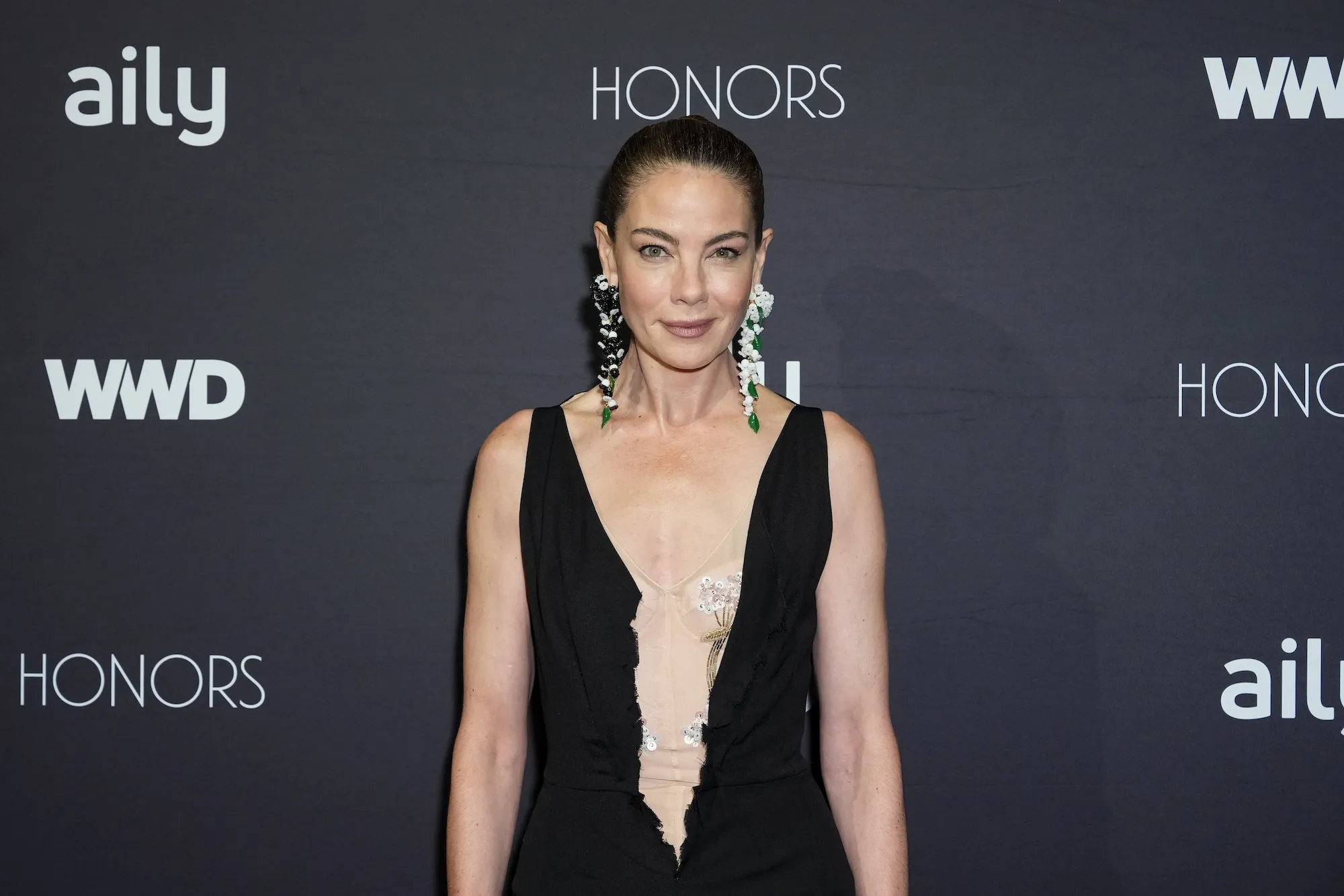 Michelle Monaghan Pairs Deconstructed Joseph Altuzarra With Statement Earrings at WWD Honors