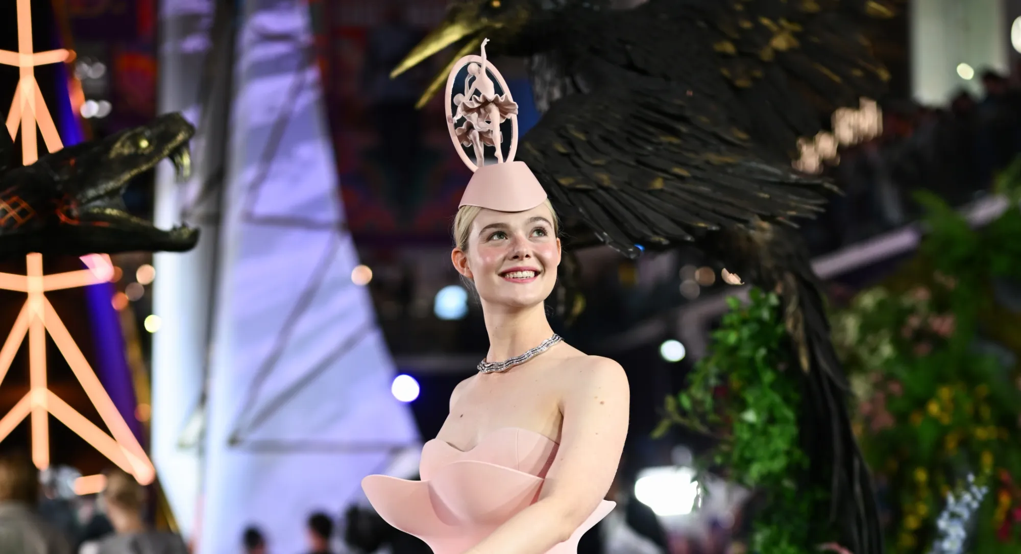 Elle Fanning Brings Effie Trinket’s Panem Style to London for ‘The Hunger Games: Sunrise on the Reaping’ Screening