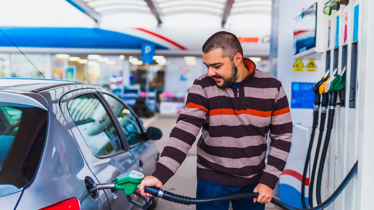 Consumer confidence edges up on decline in gas prices: Conference Board